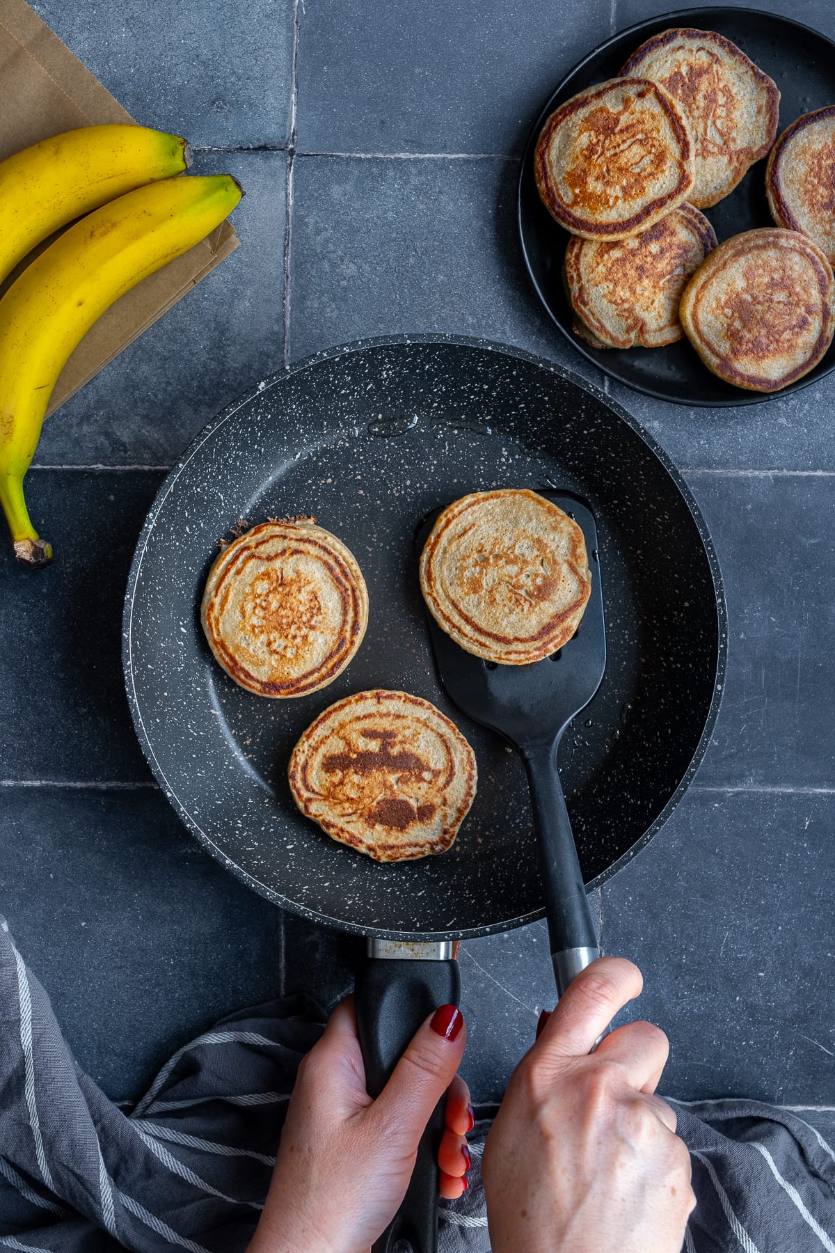 3 Ingredient Banana Oat Egg Pancakes in the frying pan