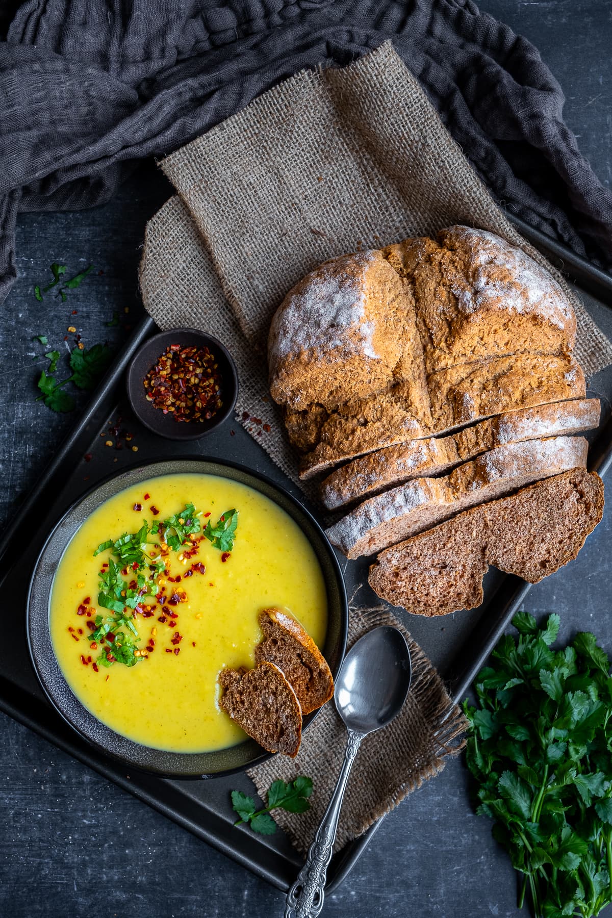 Overhead shot of Buckwheat Soda Bread with curried parsnip soup