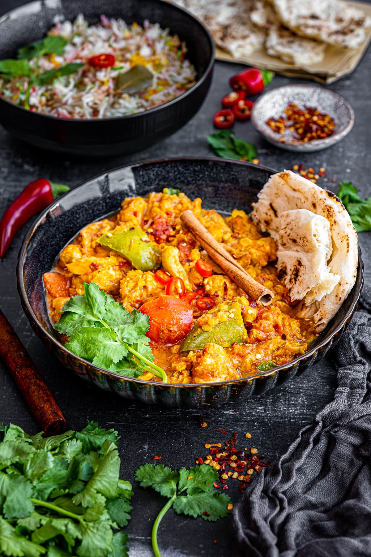 Easy Chicken Dhansak in a bowl with naan bread