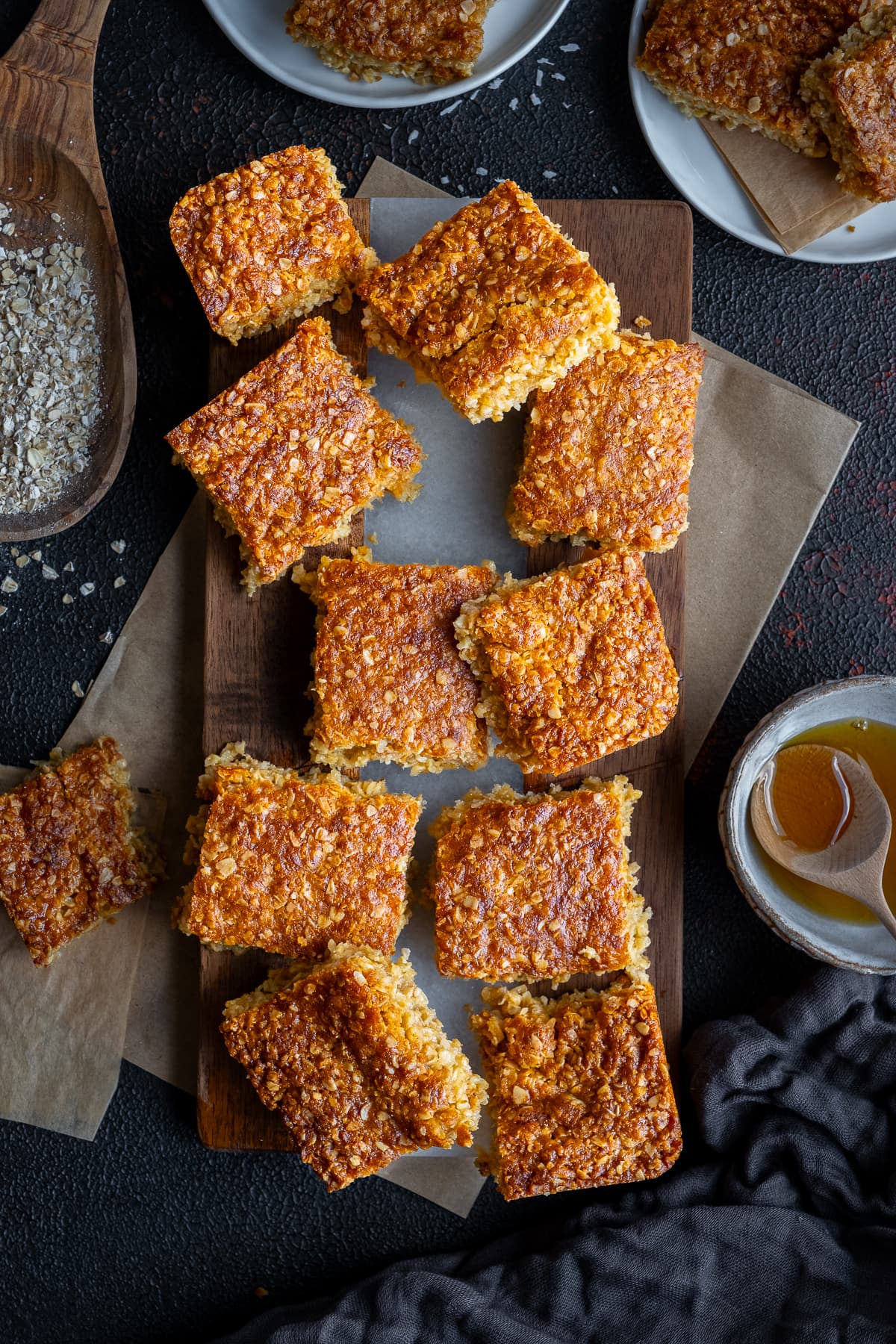 Easy Coconut Flapjacks cut up on a board