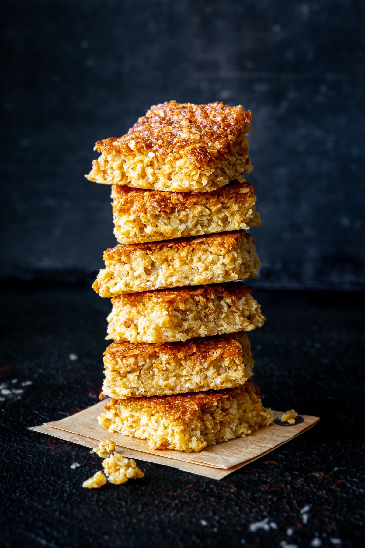 6 squares of Easy Coconut Flapjacks in a pile