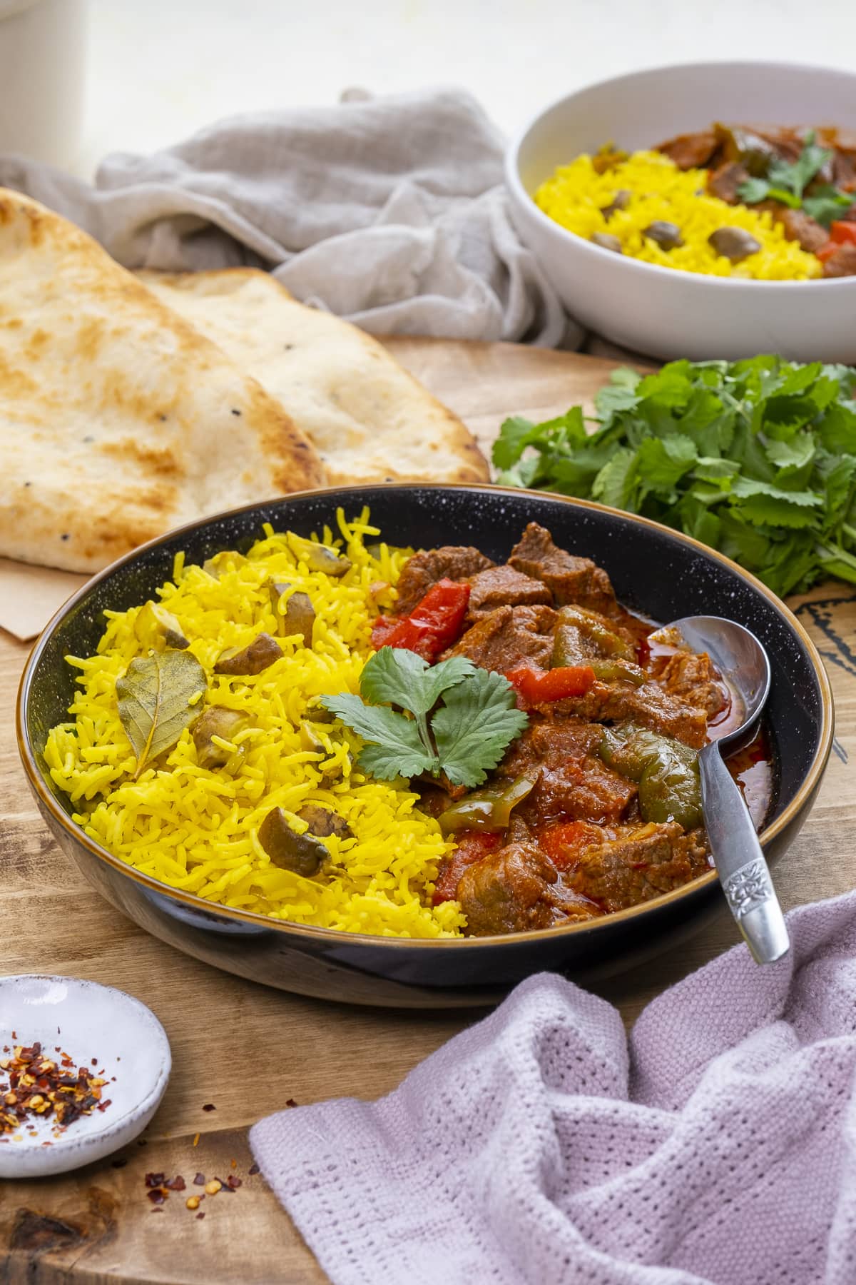 Easy Peasy Beef Curry on a plate with Mushroom Pilau Rice