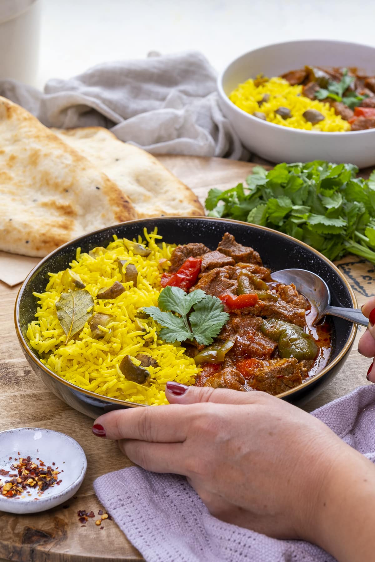 Easy Peasy Beef Curry on a plate with Mushroom Pilau Rice