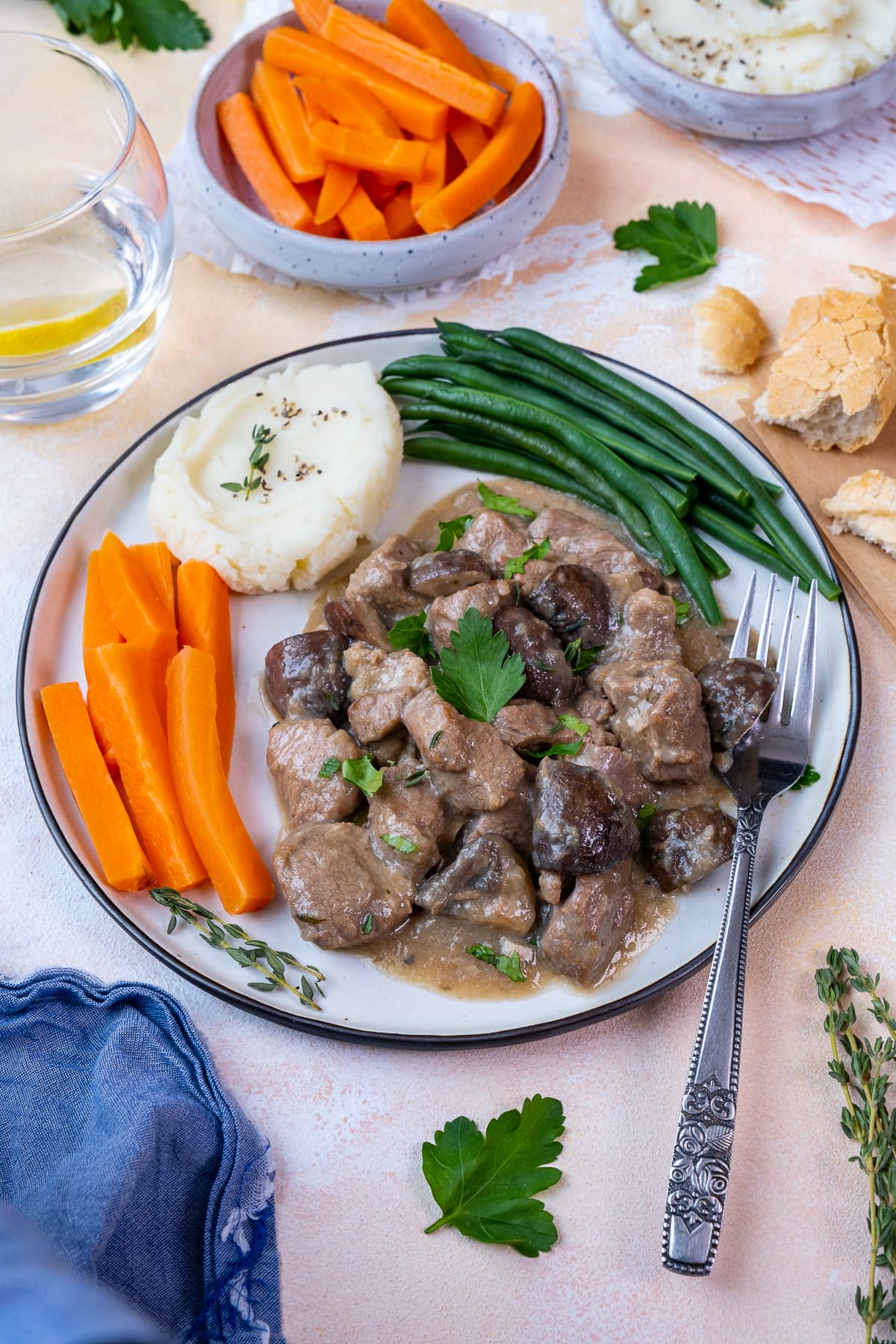 Easy Peasy Lamb Stew on a plate with mash and vegetables