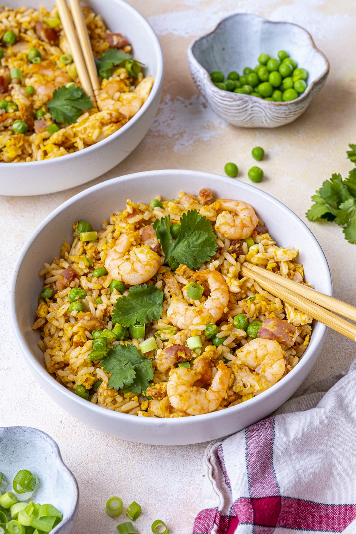 Two bowls of Easy Peasy Special Fried Rice with chopsticks