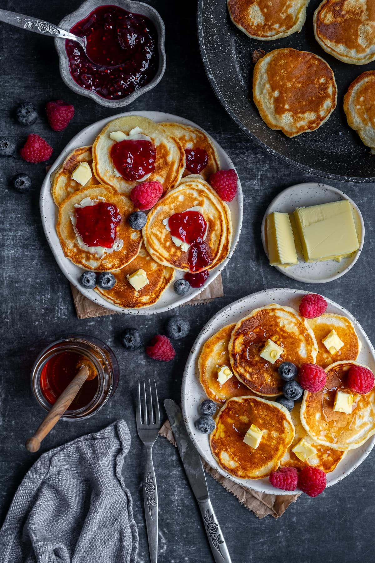 Easy Scotch Pancakes with lots of toppings options (jam, butter, berries and honey)