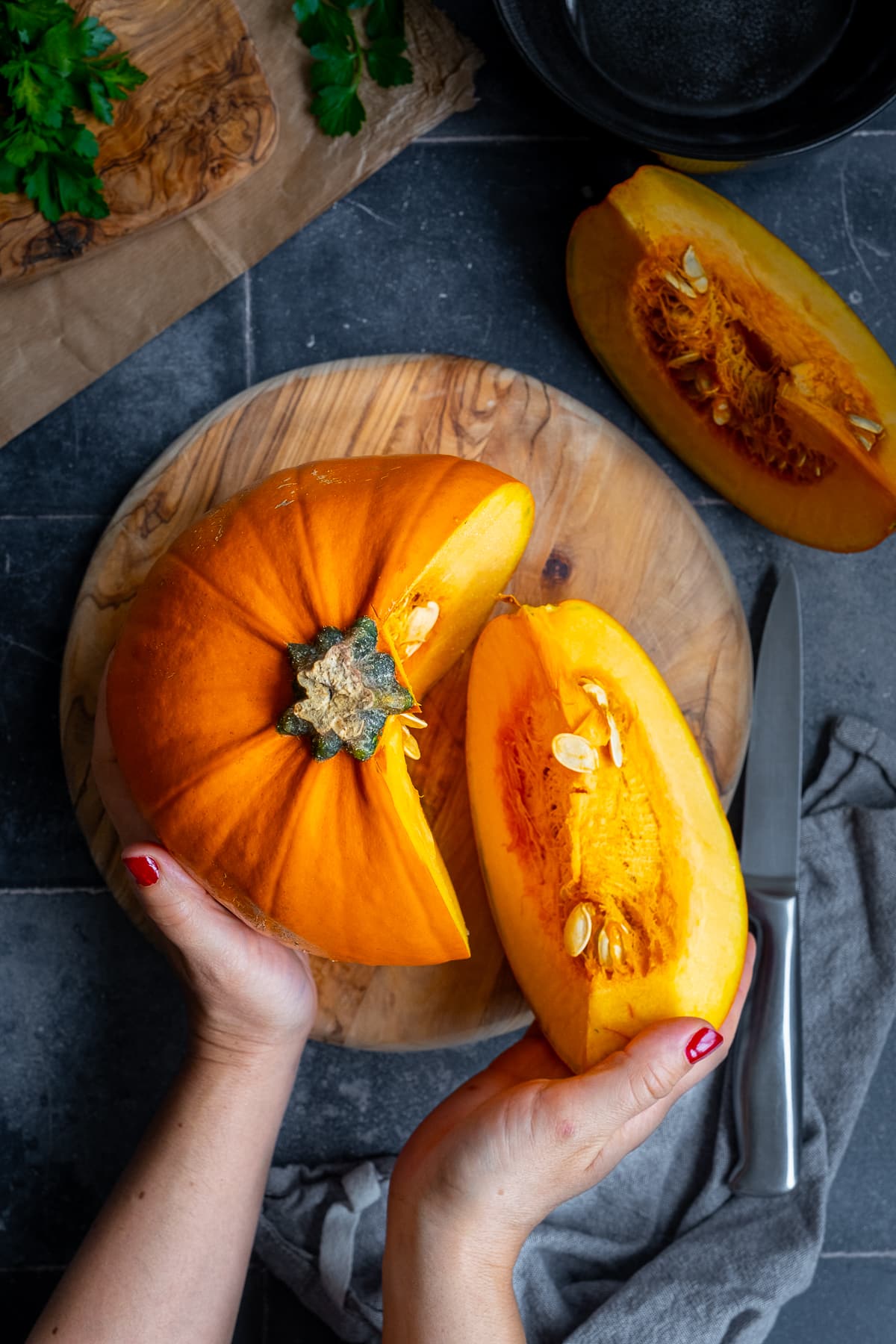 Overhead shot of a culinary pumpkin with a wedge cut out