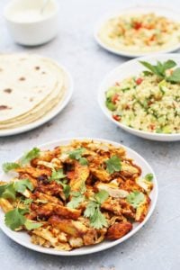 Oven Baked Chicken Shawarma with Garlic Sauce, Tabbouleh, Hummus and Flatbreads