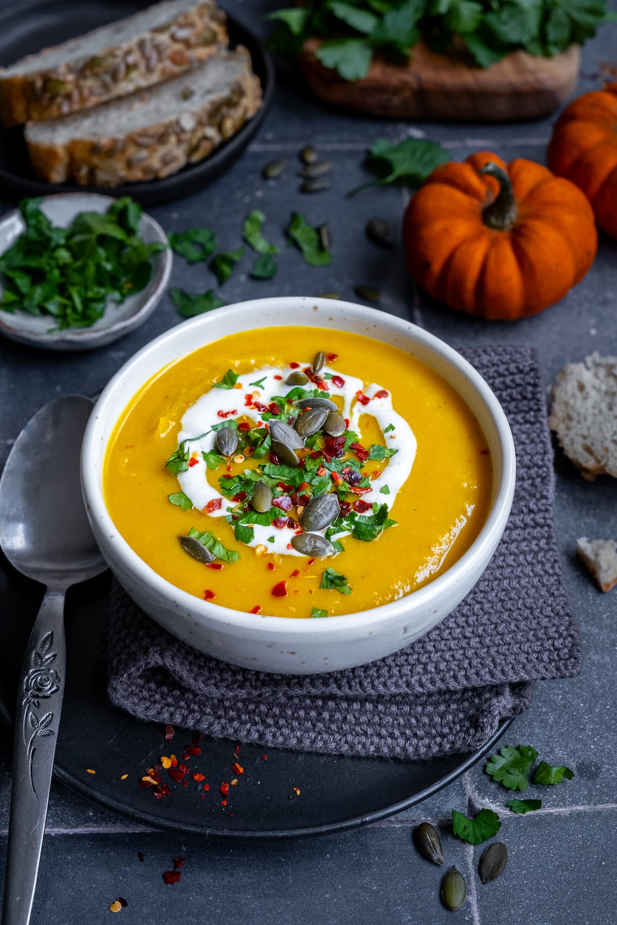 Spicy Pumpkin Soup in a bowl with garnishes