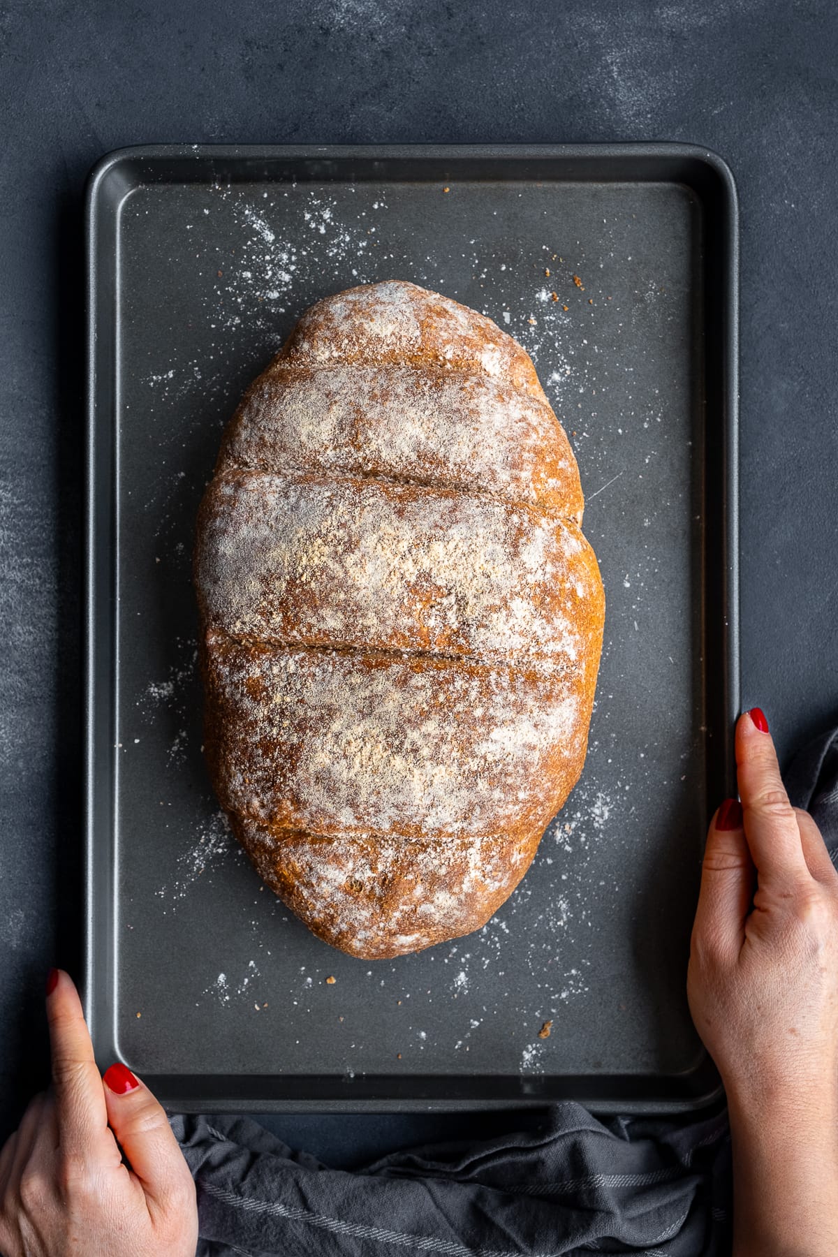 Super Simple Wholemeal Bread - cooked loaf on a baking sheet.