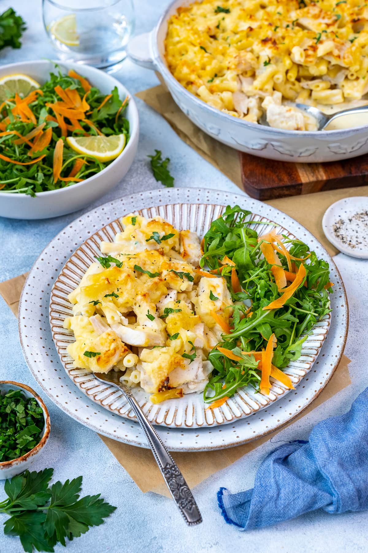 Turkey Macaroni Cheese on a plate with a side salad