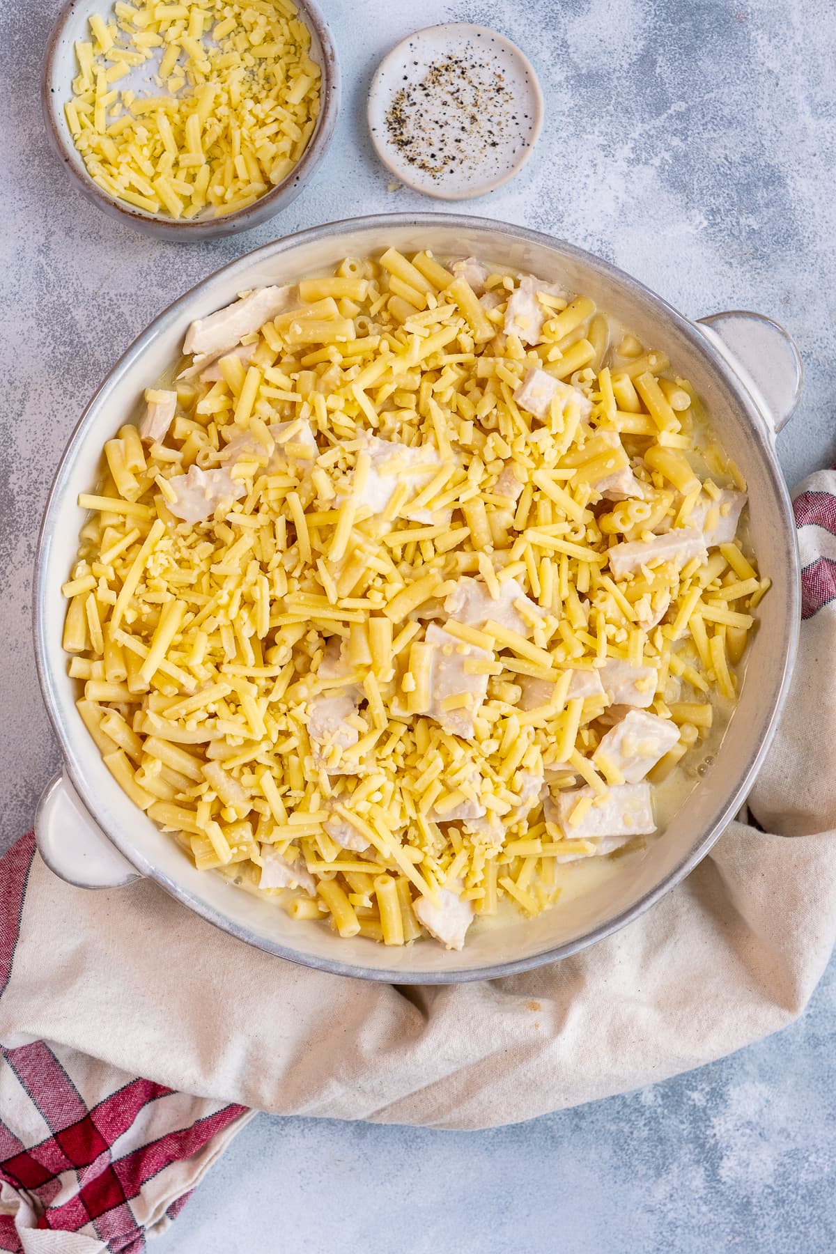 Overhead shot of uncooked Turkey Macaroni Cheese in the oven dish